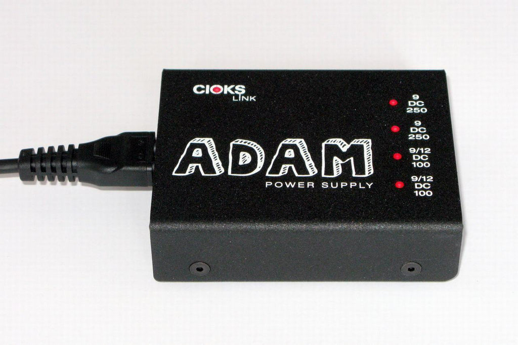 CIOKS ADAM Link pedal power supply — black enclosure top view