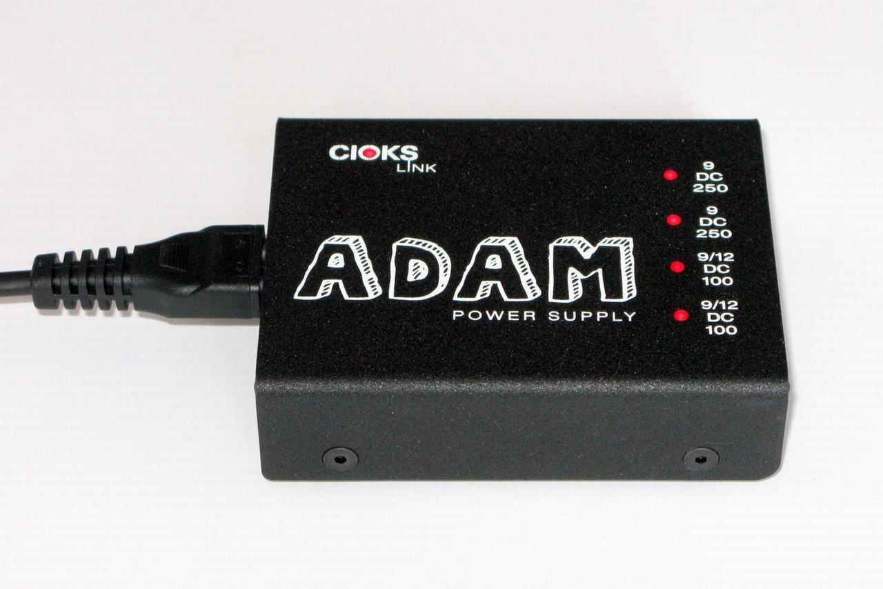 CIOKS ADAM Link pedal power supply — black enclosure top view