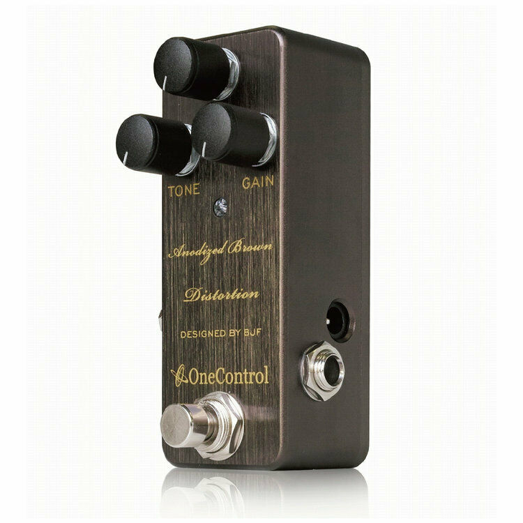 One Control Anodized Brown Distortion guitar pedal — angled side view of brown enclosure