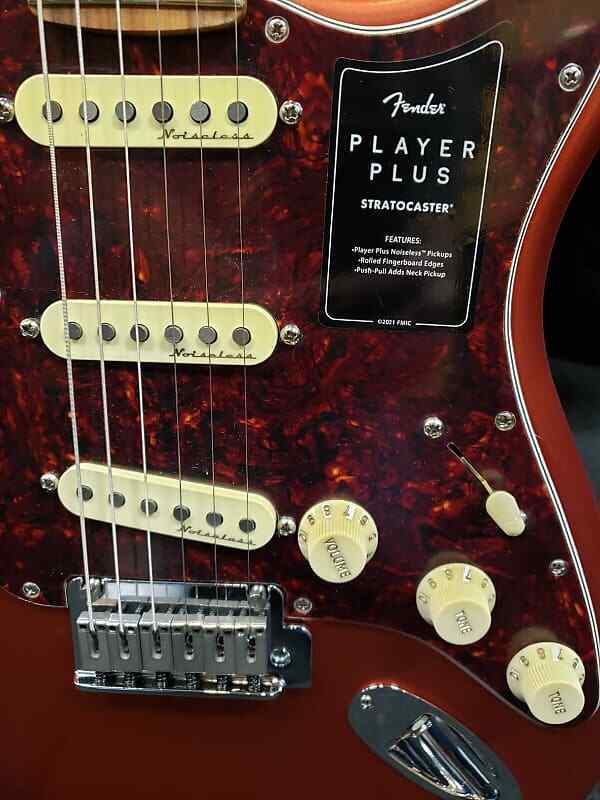 Fender Player Plus Stratocaster electric guitar — tortoiseshell pickguard detail