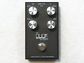 J Rockett The Dude V2 overdrive pedal — black enclosure with four silver knobs, top view