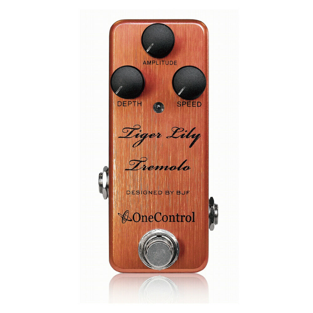 One Control Tiger Lily Tremolo guitar effects pedal — orange enclosure