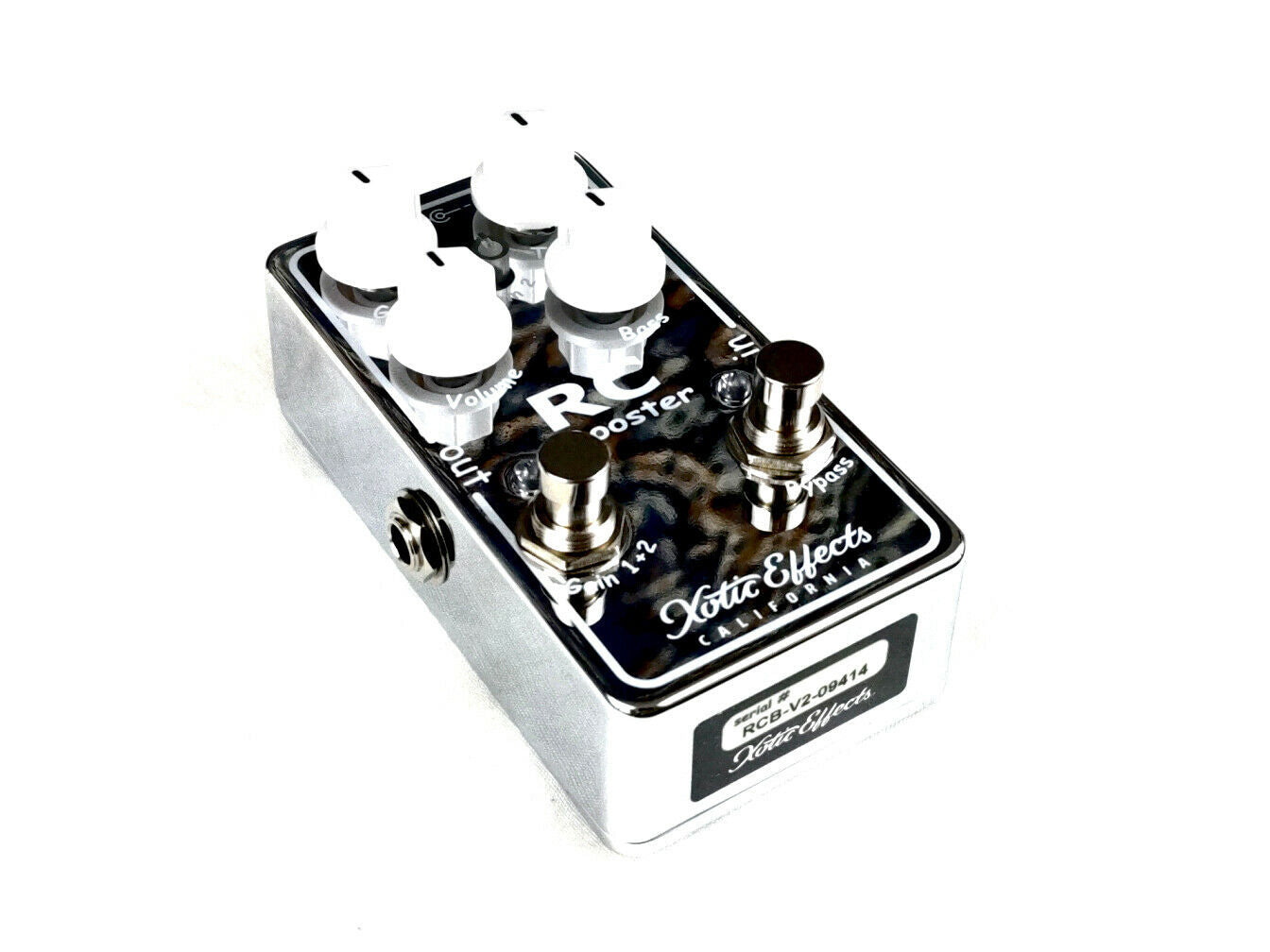 Used Xotic RC Booster V2 boost pedal — side angle showing footswitches