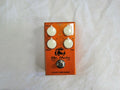 J Rockett Audio Mr Moto Tremolo Reverb Pedal — orange enclosure, top view with depth, wave, verb controls