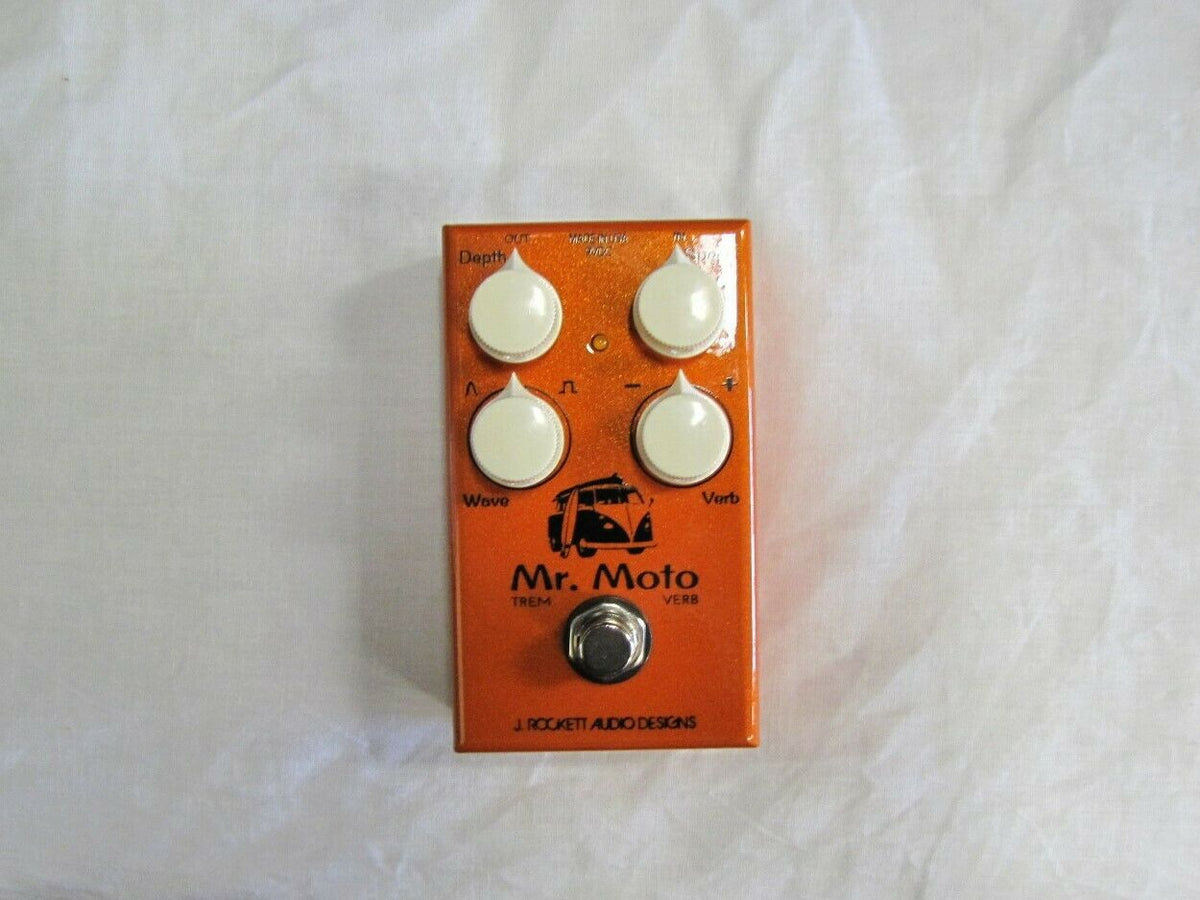 J Rockett Audio Mr Moto Tremolo Reverb Pedal — orange enclosure, top view with depth, wave, verb controls