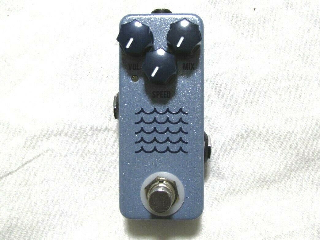 JHS Tidewater tremolo pedal in light blue sparkle with wave graphic