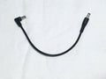 One Control DC-15-LS 15 cm black DC power cable with one angle plug and one straight plug