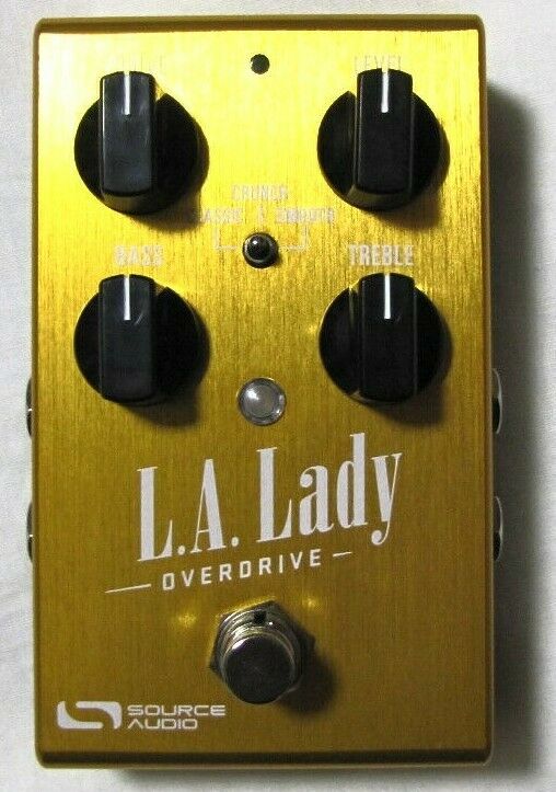 Source Audio L.A. Lady overdrive pedal — gold enclosure, top view with knobs