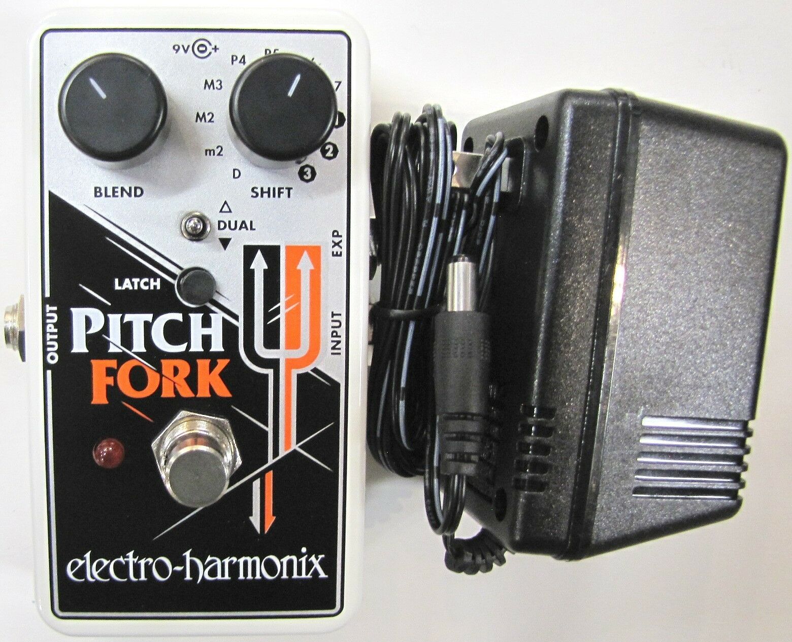 Electro-Harmonix Pitch Fork white polyphonic pitch shifter pedal shown with included AC adapter