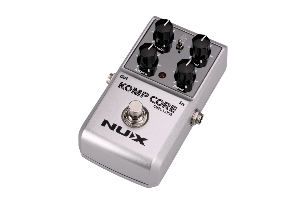 NUX Komp Core Deluxe compressor pedal — angled silver stompbox view