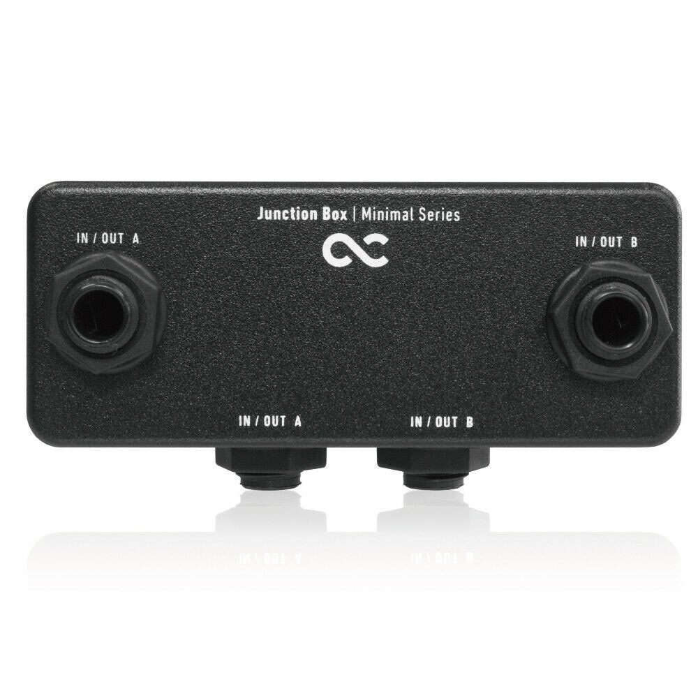 One Control Minimal Series Junction Box, black aluminum enclosure, four 1/4-inch jacks for pedalboard signal routing