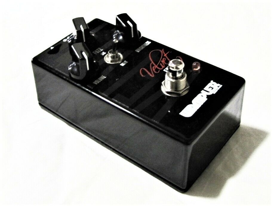 Wampler Velvet Fuzz guitar pedal angled view of black enclosure and footswitch