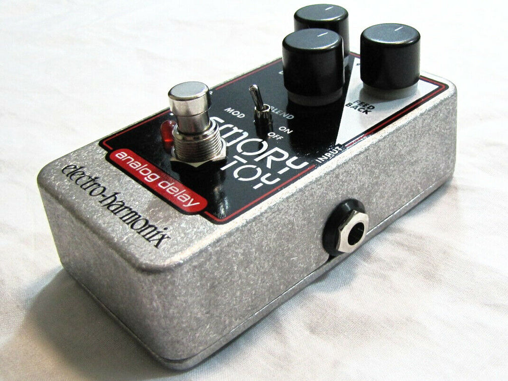Electro-Harmonix Memory Toy analog delay pedal — angled view showing input/output
