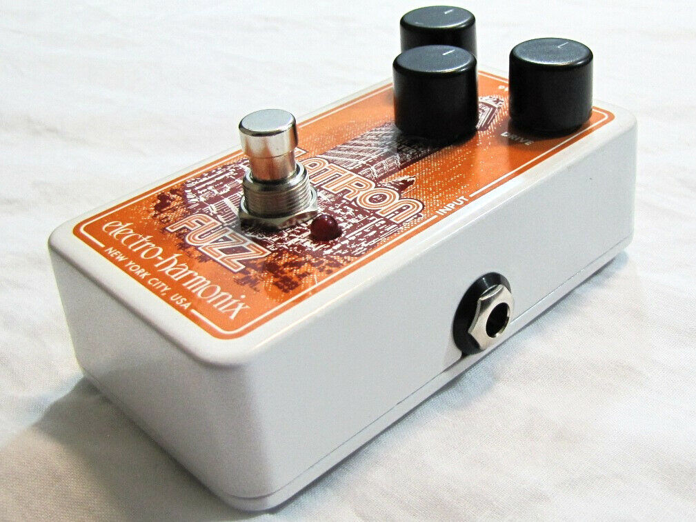 Electro-Harmonix Flatiron Fuzz guitar pedal — angled view showing side jacks