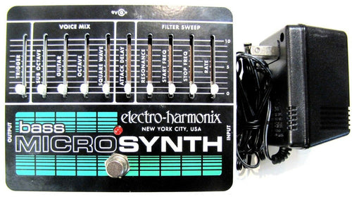 Electro-Harmonix Bass Micro Synthesizer pedal — black enclosure with sliders and power supply