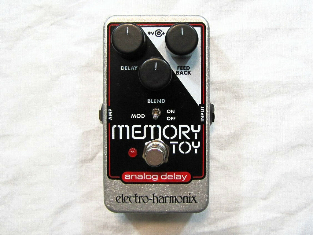Electro-Harmonix Memory Toy analog delay pedal — front view, silver and black enclosure