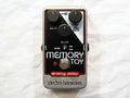 Electro-Harmonix Memory Toy analog delay pedal — front view, silver and black enclosure