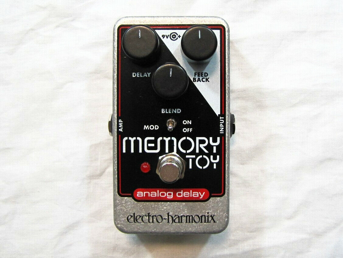 Electro-Harmonix Memory Toy analog delay pedal — front view, silver and black enclosure