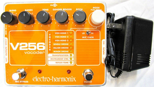 Electro-Harmonix V256 Vocoder vocal effects pedal — front view, orange enclosure with PSU