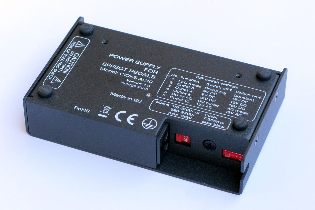 CIOKS AC10 pedal power supply — bottom with mounting holes