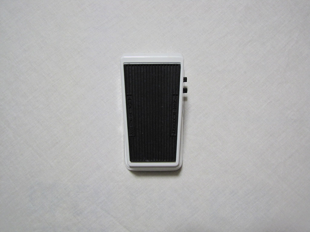 Dunlop Cry Baby Mini CBM105Q bass wah pedal — silver enclosure, black treadle, top view