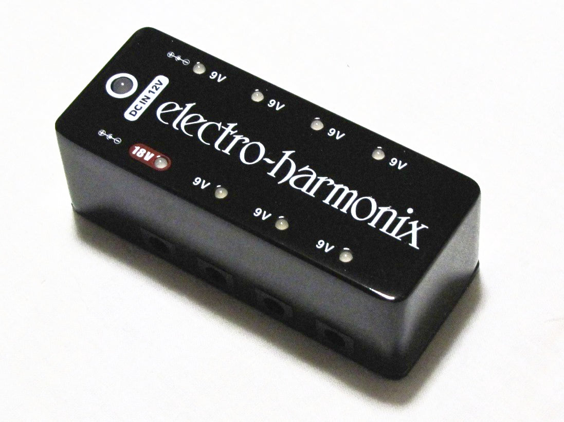 Electro-Harmonix S8 power supply — black pedalboard power unit, angled view